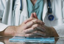 Does someone praying for you really make a difference? doctor praying